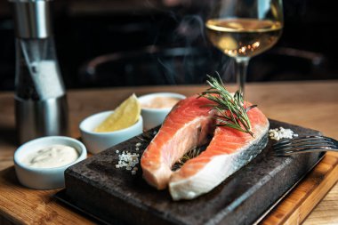 salmon steak on hot stone