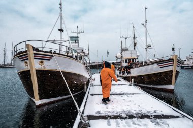 professional fishermen are preparating for fishing