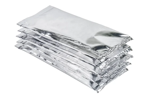 Imballaggio in alluminio su bianco — Foto Stock