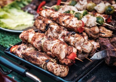 heap of delicious juicy skewer with vegetables