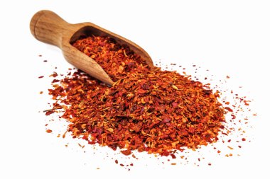 spicy chili with wooden spoon scoop isolated on white