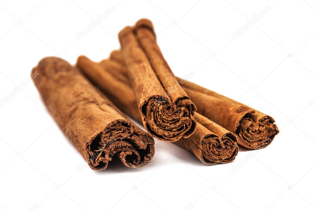 original ceylon cinnamon stick isolated on white