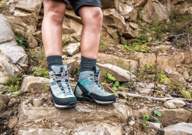 female legs in comfortable hiking boots