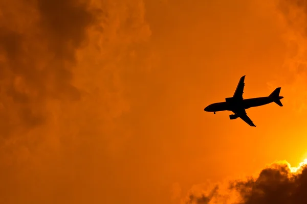 Zachód słońca samolot tło — Zdjęcie stockowe