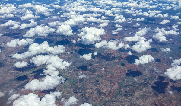 Clouds with earth in distance