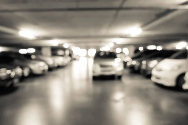 Parcheggio auto con luci bokeh — Foto Stock