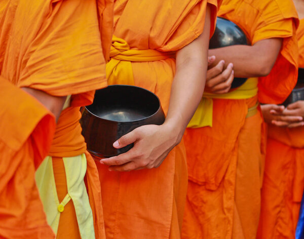 Buddhist monks in orange robes 