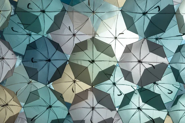 Umbrellas under sky — Stock Photo, Image