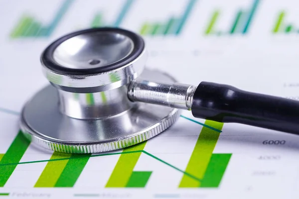 Stethoscope Charts Graphs Spreadsheet Paper Finance Account Statistics Investment Analytic — ストック写真