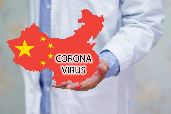 Doctor with coronavirus alphabet on china flag and map cause many people sick at Wuhan city in China.