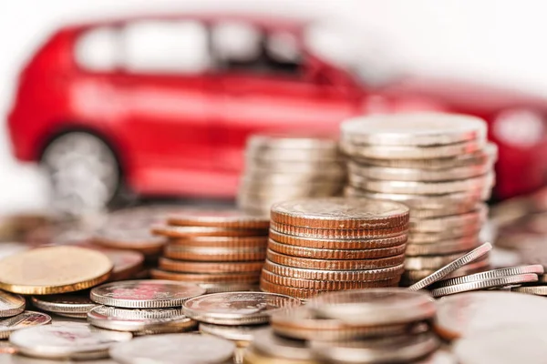 Car with stack coin : Car loan, Finance, saving money, insurance and leasing time concepts.