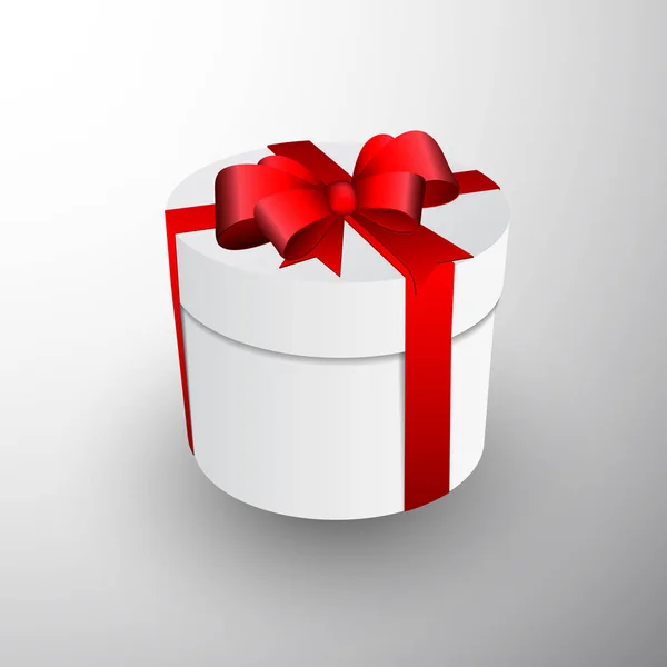 Caja de regalo de Navidad con vector rojo arco — Vector de stock