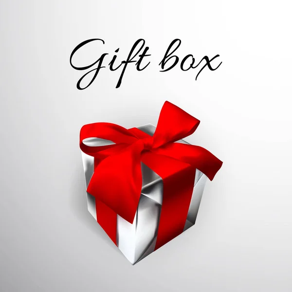 Realistische Geschenkbox mit roter Schleife isoliert auf grauem Hintergrund. Vektorillustration — Stockvektor