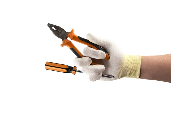 Destornillador naranja y alicates en la mano en guante aislado sobre fondo blanco —  Fotos de Stock