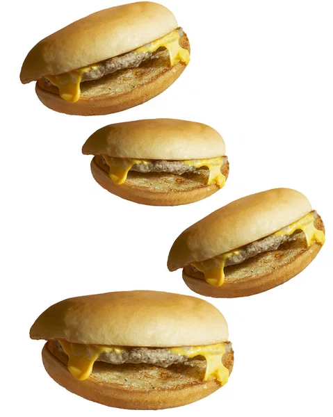 下降多汁汉堡与奶酪分离的白色背景纹理 — 图库照片
