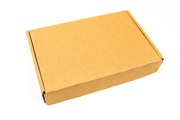 Закрытая прямоугольная картонная коробка — стоковое фото
