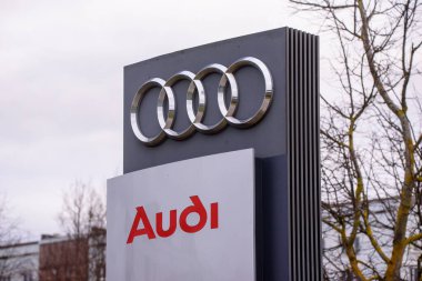 RIGA, LATVIA. 17th March 2020. AUDI company logo near Audi centre in Riga. Audi is a German automobile manufacturer. clipart