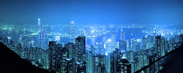 Panoráma vire Hongkong városkép éjszaka Hong kong city. — Stock Fotó