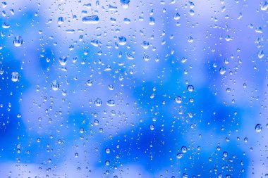 Mavi Arkaplanda Su Damlaları