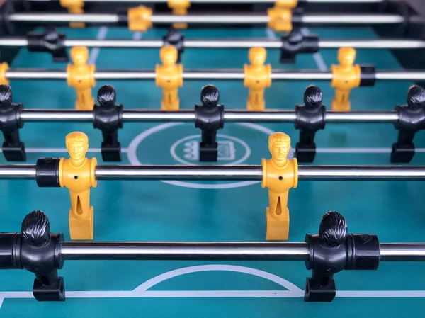 Table football game, Soccer table with yellow and black players