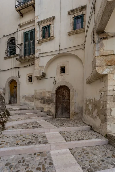 Historic town of Rodi Garganico on a rock high above the sea with narrow streets and steep stairs, Gargano Peninsula, Province of Foggia, Italy