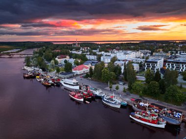 Aerial view of retro steamships at the pier.