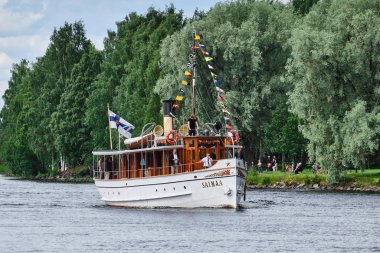 Traditional retro steamships regatta on the Pielisjoki river.