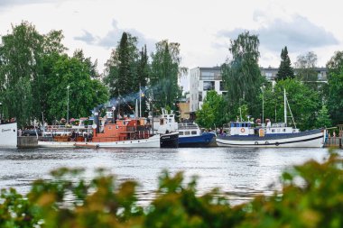 Traditional retro steamships regatta on the Pielisjoki river.