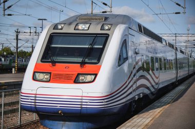 Allegro train is arriving at the station. Train Pendolino SM6 Helsinki, Finland - St.Petersburg, Russia.