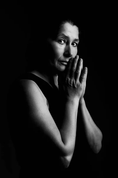 Emotional black and white portrait woman prays — Stock Photo, Image