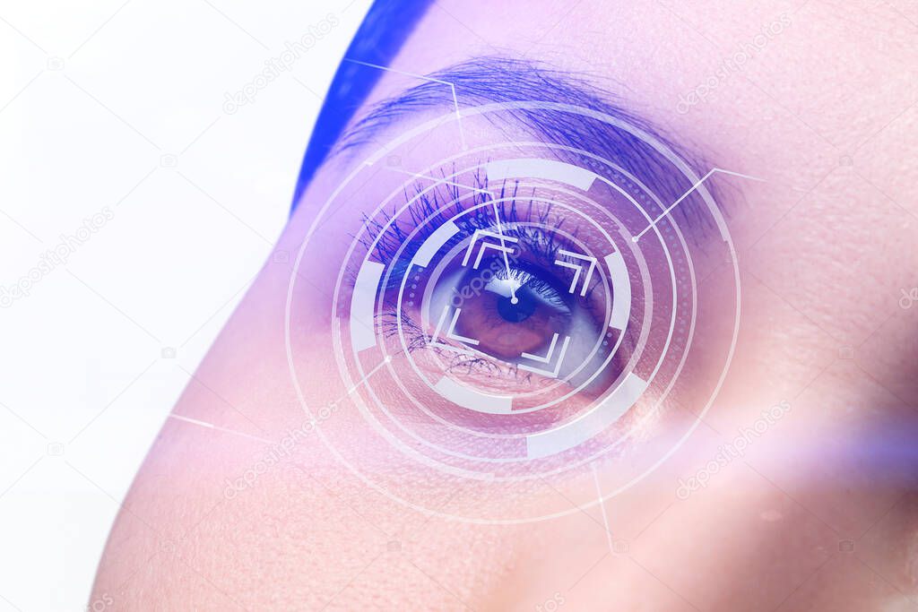 Modern cyber woman with technolgy eye looking. The young woman 's eye is close-up. The concept of the new technology is iris recognition.