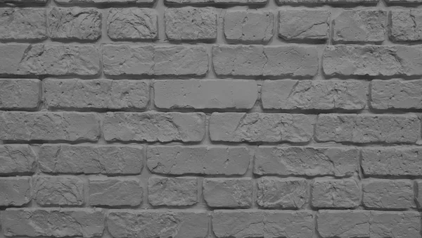 Brick wall in black and white spectrum.