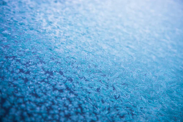 Frozen window patterns. Blue background. Abstraction. Frost — Stock Photo, Image