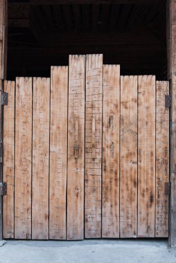 Wooden gate doors. Background with rough texture.