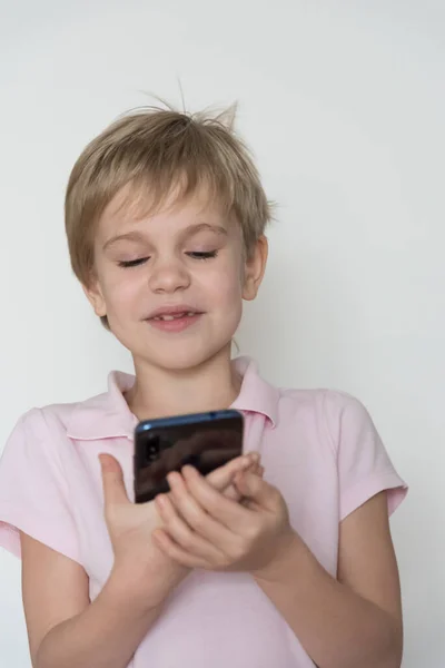 Cute Child Laughing Loudly Holding Cell Phone His Hand Kid — Stock Photo, Image