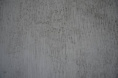 Şok edici kaplamalar, oyun alanlarında, stadyumlarda, koşu bantlarında ve kaldırımlarda kullanılan lastik kırıntılarından yapılır. Gri.