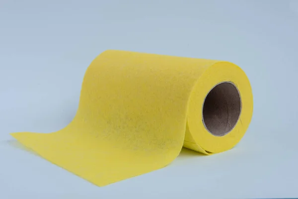 Yellow microfiber cloth for cleaning in a roll. — Stock Photo, Image
