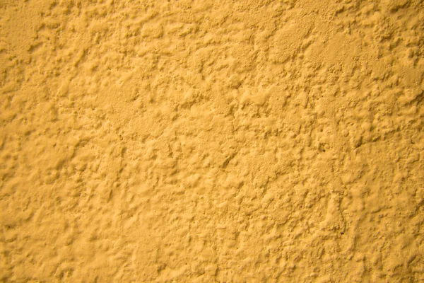 Gul väggstruktur. Ljust varm gul vägg — Stockfoto