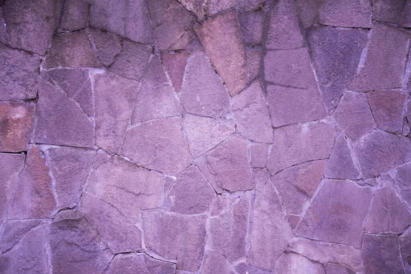 Natural stone of beautiful shades. The fragment, texture. Purple