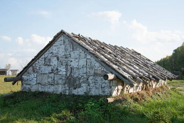 housing covered with tree bark on the outside. Museum, sample. Retro. Ethnic