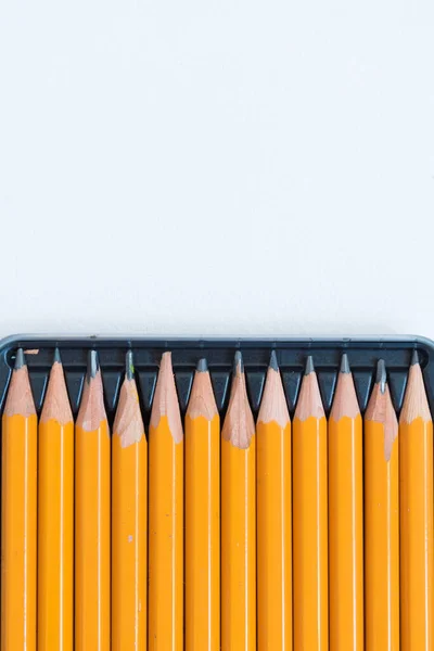 Simple pencils in a box. Background, texture.