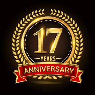 Çelenk, şerit ve altın yüzük logosu ile 17 yıl yıldönümünü kutluyor