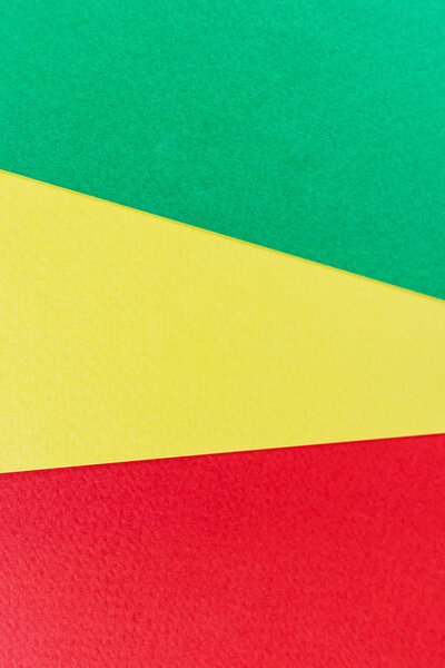 Texture paper yellow, green and red. Background image. Minimalism, flat lay, place for text.
