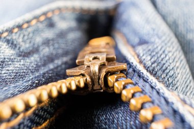 Kotun fermuarı yakın plan, makro fotoğraf. Kıyafetler için aksesuar kavramı.