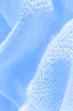 Mavi örülmüş kumaş dokusu. Yakın plan..