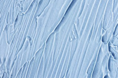 Şeffaf kozmetik antibakteriyel jel yakın çekim. Temizlik kavramı. Antiseptik. Açık mavi arkaplan.