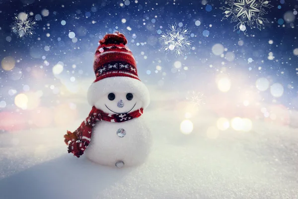 Merry snowman standing in a winter night Christmas landscape. Merry Christmas and Happy New Year Greeting Card — Stock Photo, Image