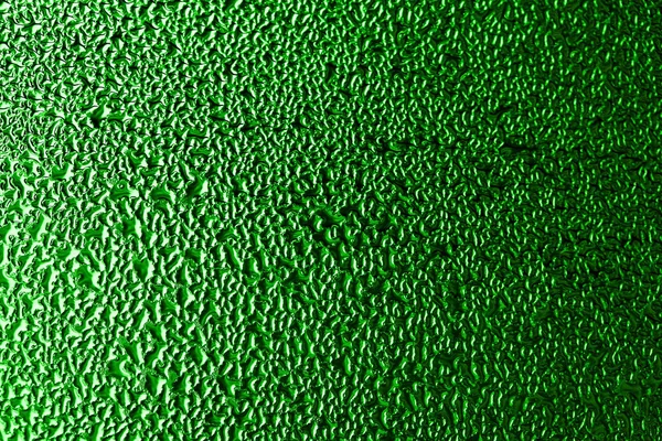 抽象化です緑の背景に水が落ちますデザインの背景がぼやけていますm — ストック写真
