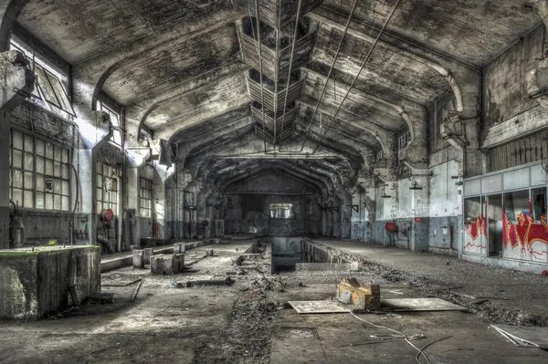Dilapidated warehouse in an abandoned factory Royalty Free Stock Images