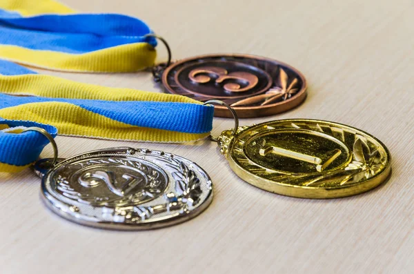 Gold, silver and bronze sports medals. — Stock Photo, Image